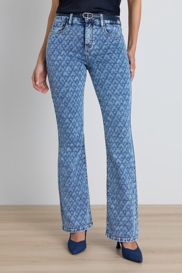 The Aria Flare Jean in atelier blue, jacquard textured denim with a subtle monogram and high rise