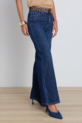 Detail of the Celeste Slim Palazzo Jean in dark wash showing the yellow stitching
