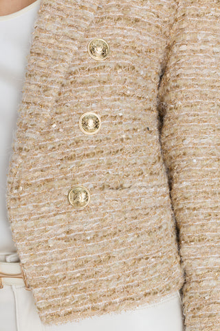 Detail of the Gabrielle Tweed Blazer in gold multi showing the metallic tweed texture