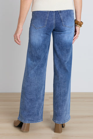 Back view of the Celeste Slim Palazzo Jean - Medium Blue showing the wide-leg fit