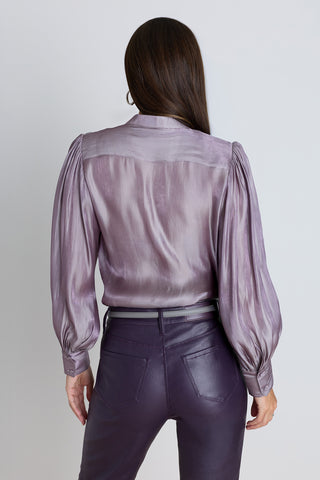Back view of the Colette Blouse in Lavender showing the voluminous sleeve silhouette
