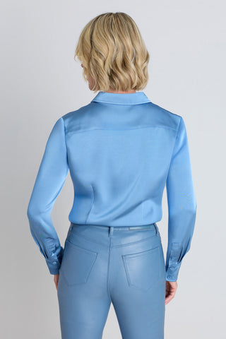 Back view of the Paulina Silk Blouse - Coastal Blue showing the tailored fit