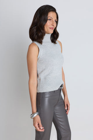 The Ramona Cashmere Sleeveless Sweater in mist grey shown in a styled outfit view