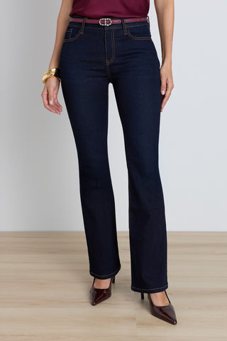 The Aria Flare Jean in indigo, high-rise stretch denim with contrast yellow stitching