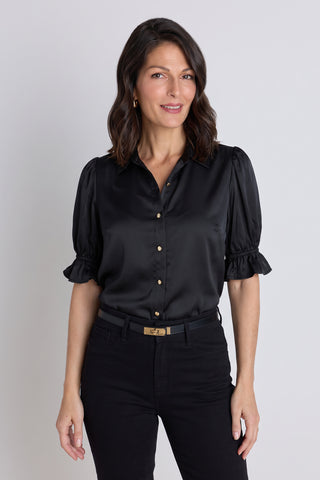 The Cindy Ruffle Sleeve Blouse in black with gold buttons and three-quarter ruffle sleeves