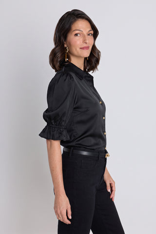 Detail of the Cindy Ruffle Sleeve Blouse in black showing the gold front buttons