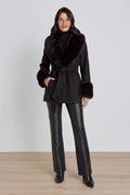 Isabel Fur Trim Coat in Black styled on model, showing the belted silhouette and faux fur collar, The Noli Shop