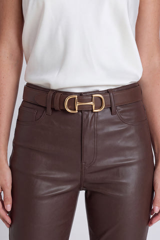 The Bettie Belt in java worn at the waist, showing the brown leather and gold buckle