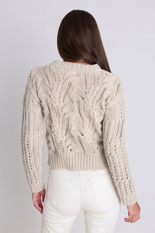 Back view of the Elea Crystal Sweater - Pearl showing the ribbed cuffs and hem