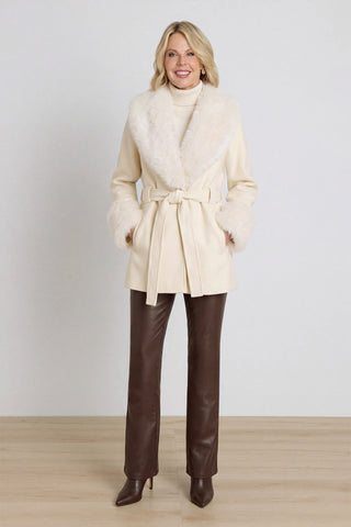 Isabel Fur Trim Coat in Pearl styled on model, showing the belted silhouette and faux fur collar, The Noli Shop