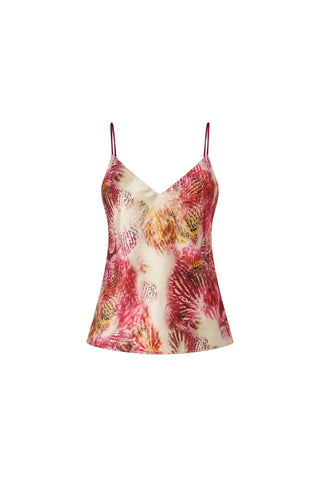 The Yara Silk Camisole - Bright Orchid is a sleeveless silk camisole with thin adjustable straps, featuring a bright orchid abstract floral print on a cream background.