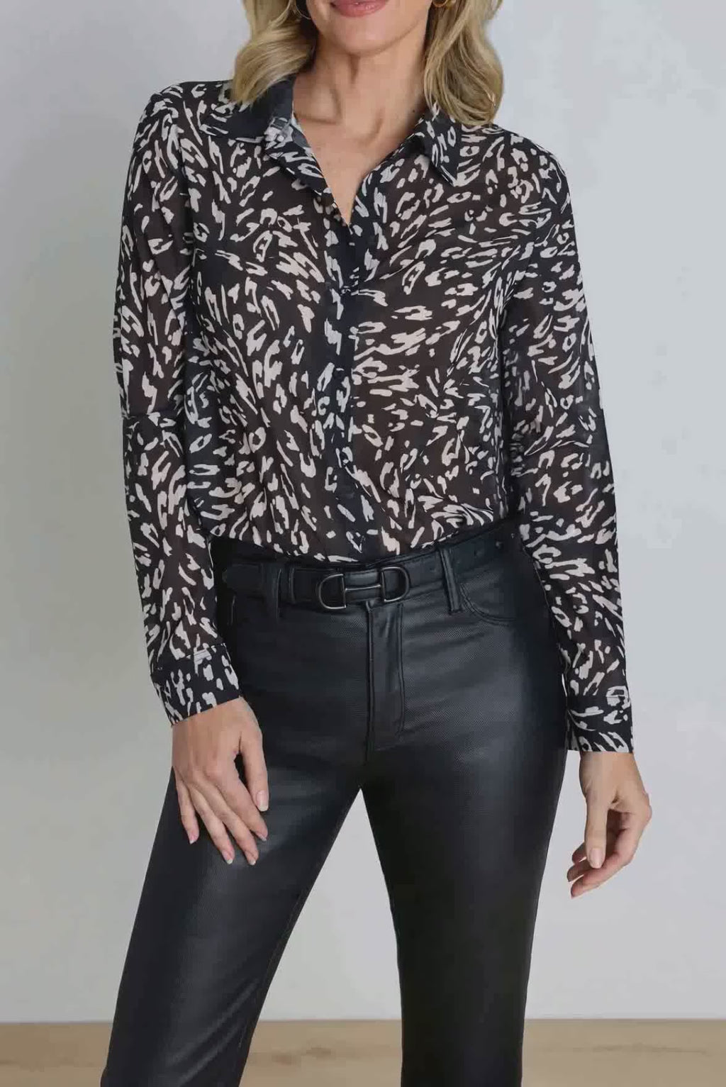 Video of the Ana Chiffon Blouse in Black/White Leopard in motion, showing the fluid chiffon drape and black and white leopard print.