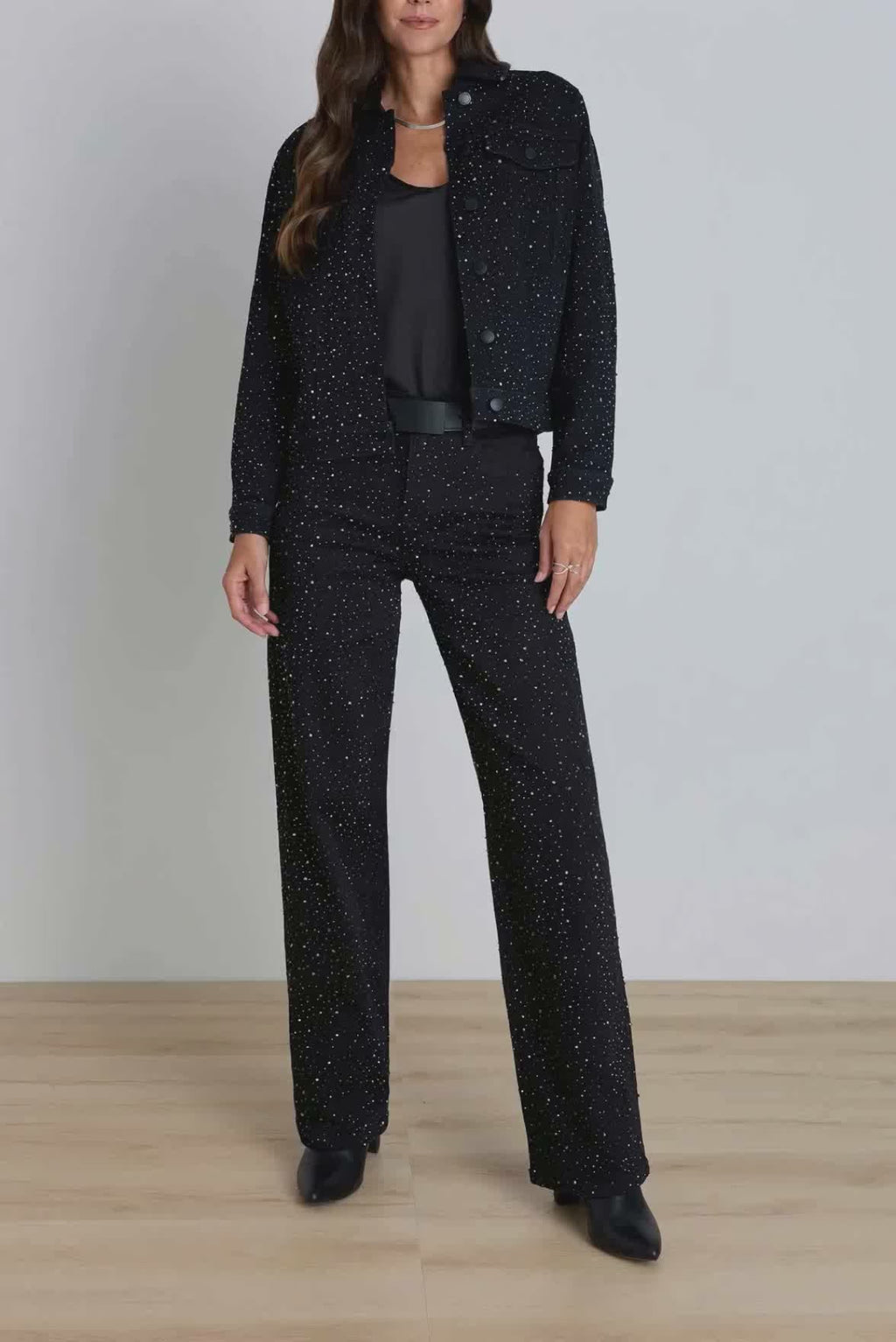 Video of the Sybil Crystal Denim Jacket in Black on model, showing the crystals catching light and the slim silhouette in motion